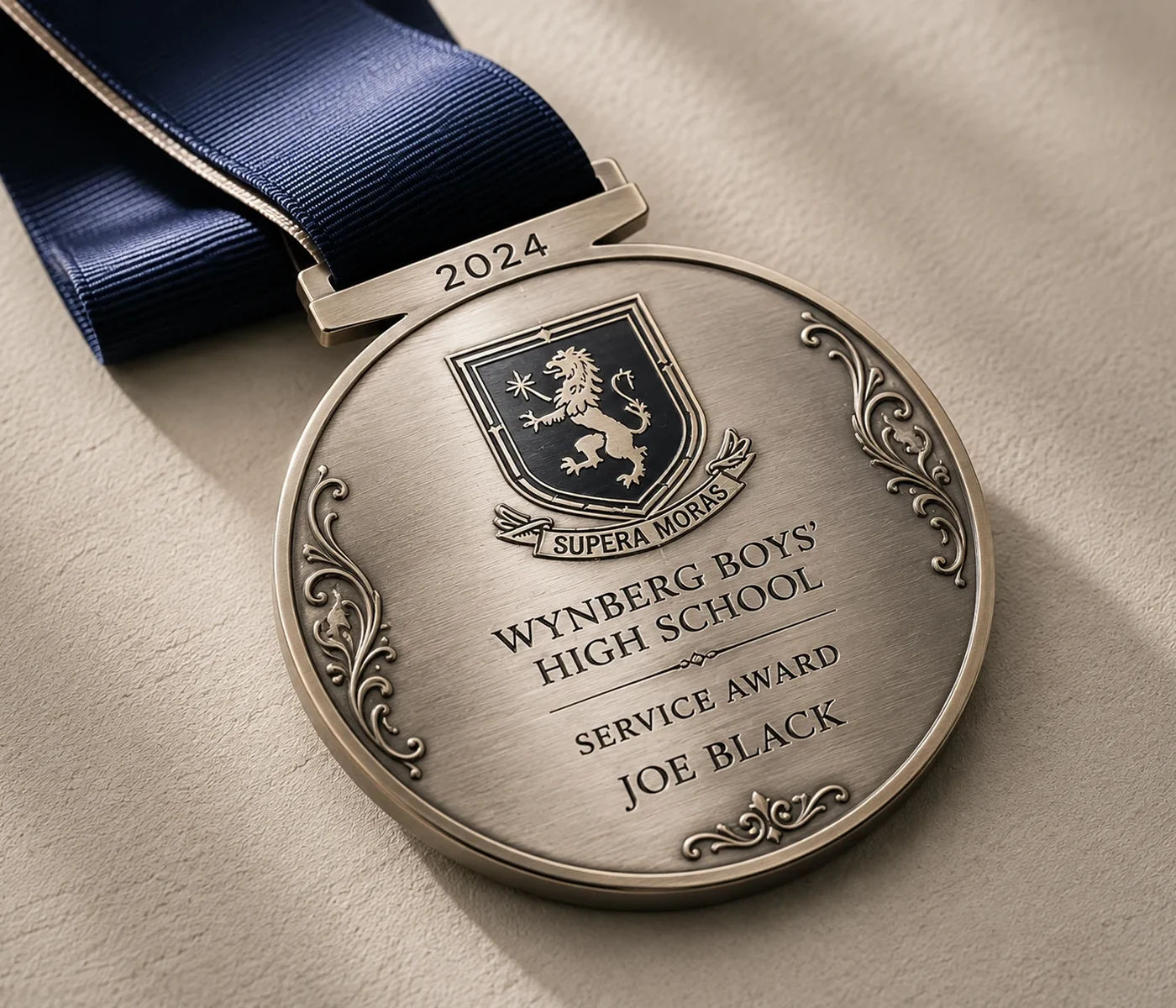 Decorative engraved medal with ribbon